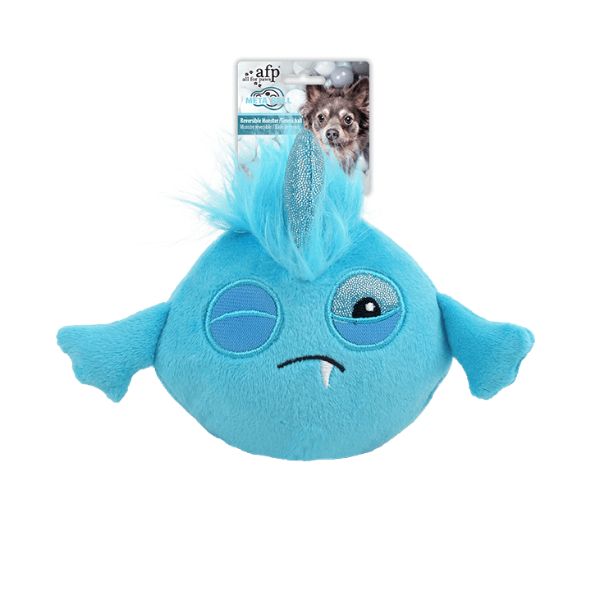 בובה דו צדדית מפלצת כדור טניס AFP